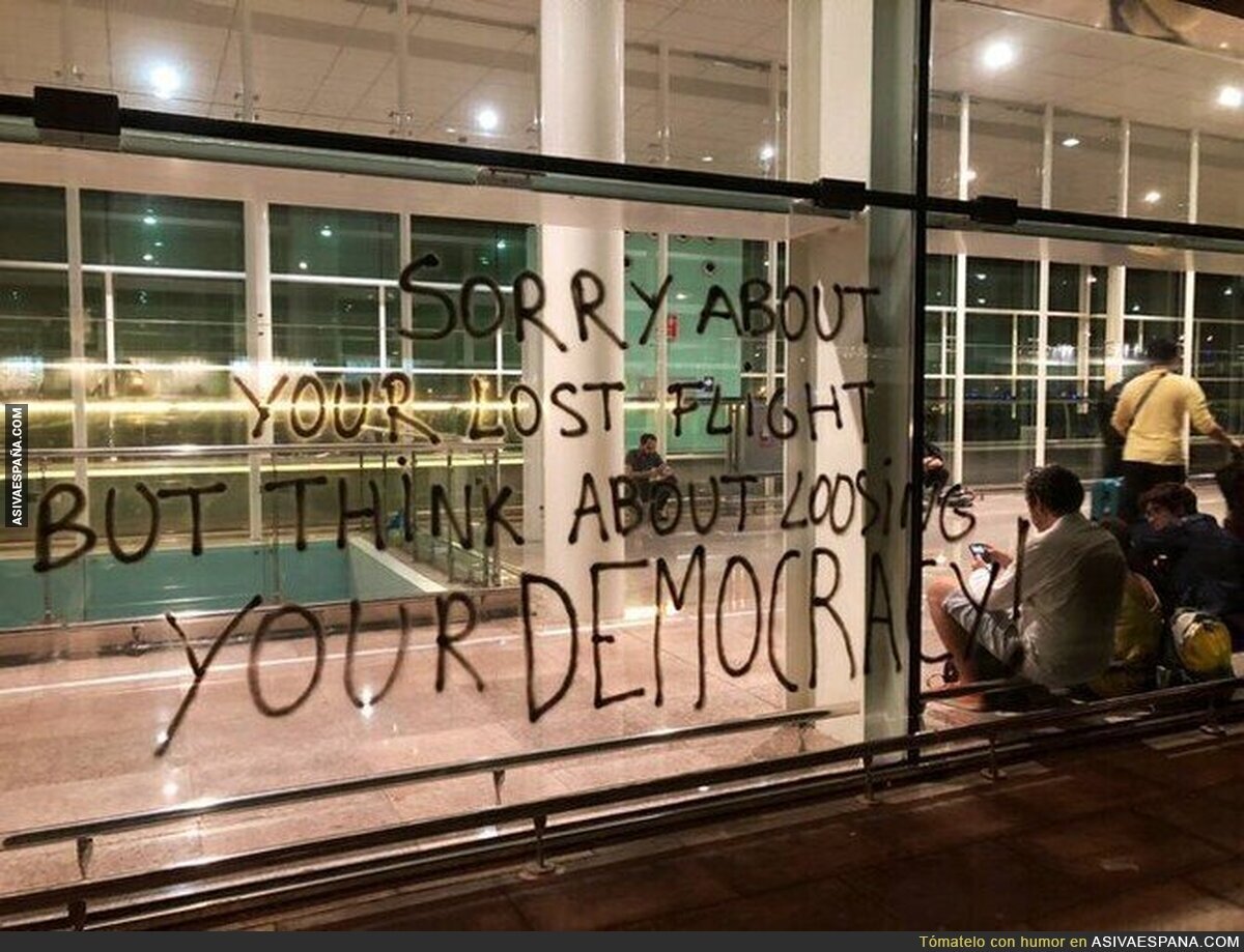 Brillante pintada en los cristales del aeropuerto de Barcelona